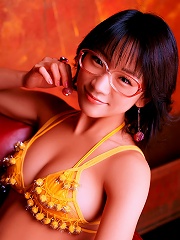 Adorable gravure idol being terribly cute in glasses and a bikini